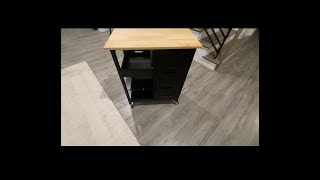 Mobile kitchen island is easy to assemble, sturdy and has wheels