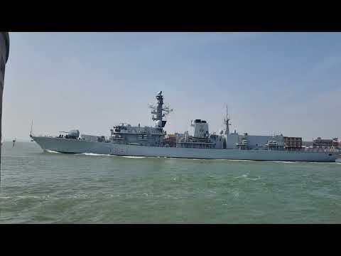 HMS Westminster sailing past the roundtower Portsmouth harbour