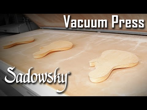 Sadowsky Work Shop - Vacuum Press (how the top wood gets bent around chambered bodies)