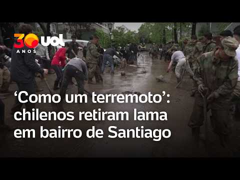 Moradores retiram lama em bairro de Santiago mais afetados por chuvas no Chile