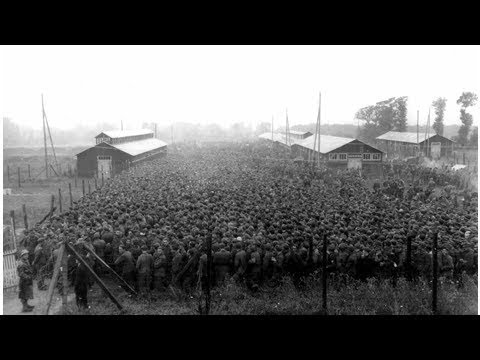 German prisoners of war packed into the Nonant le Pin prisoner camp, 1944