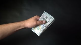 A Bundle of Money in the Hand of People  Stock Footage  Videohive
