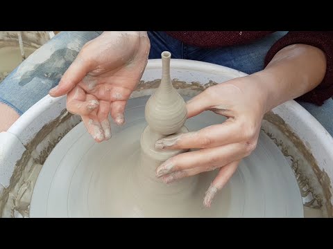 Throwing a miniature vase off the hump