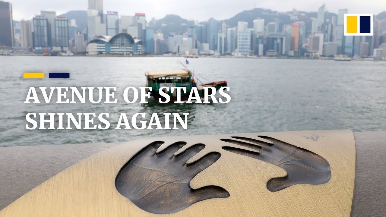 Walk along Hong Kong’s Avenue of Stars and see movie star handprints