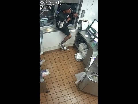 Man climbs through Taco Bell drive-thru with a gun