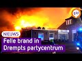 Vlammen slaan metershoog uit partycentrum | Omroep Gelderland