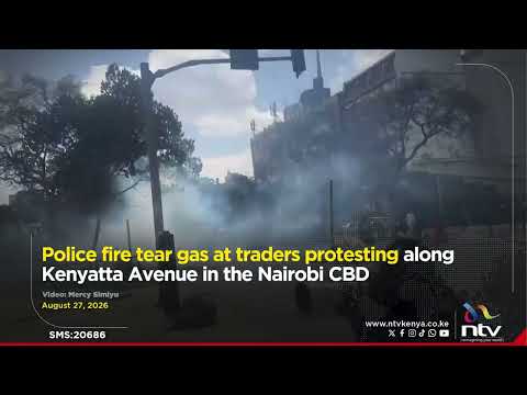 Police fire tear gas at traders protesting along Kenyatta Avenue in the Nairobi CBD