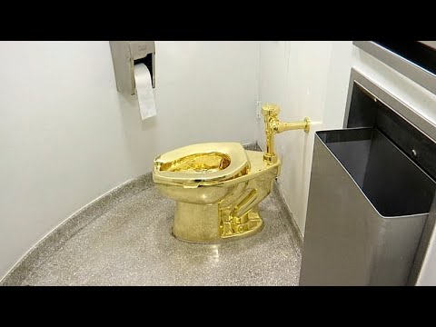 Solid gold toilet sells for $12 million at auction