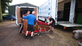 Moving a grand piano into a top floor window near Cranbrook.