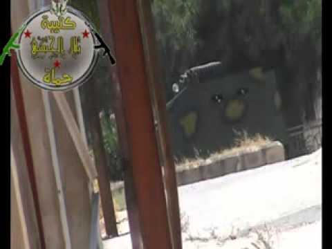 اشتباكات وتدمير مدرعة لقوات النظام من قبل كتيبة بلال الحبشي في مدينة حماة