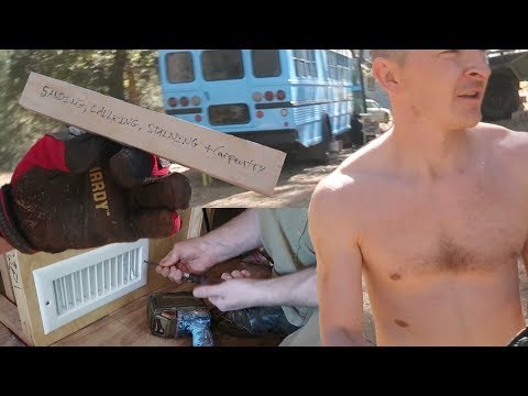 #88 SKOOLIE BUS CONVERSION | Carpentry, Staining, Sanding and Caulking the School Bus