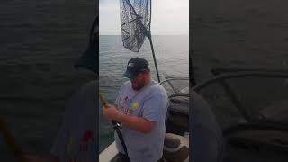 Sam Fighting a Steelhead on Lake Erie