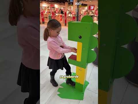 De draak die snoep uitdeelt in het winkelcentrum 🐉