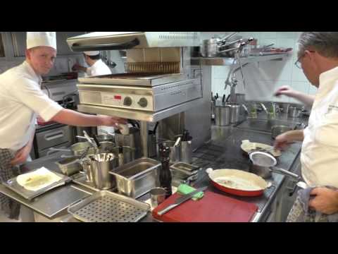 Busy kitchen at the 3 Michelin star restaurant Hof Van Cleve