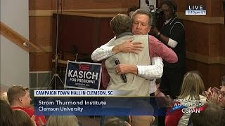 John Kasich hugs supporter (C-SPAN)