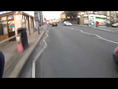 Red Almera couldn't keep pace with a cyclist!