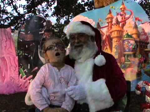 Fort Benning Families welcome Santa Clause on the lawn of Riverside