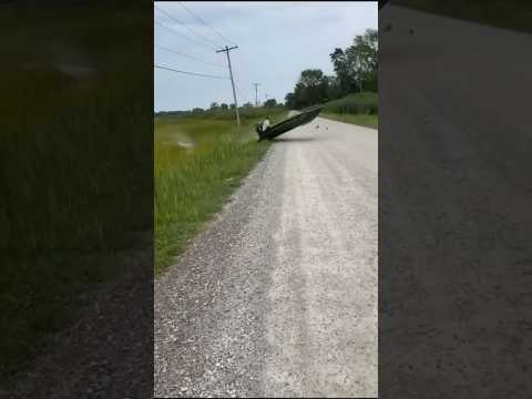 Mud Boat Crossing the Street