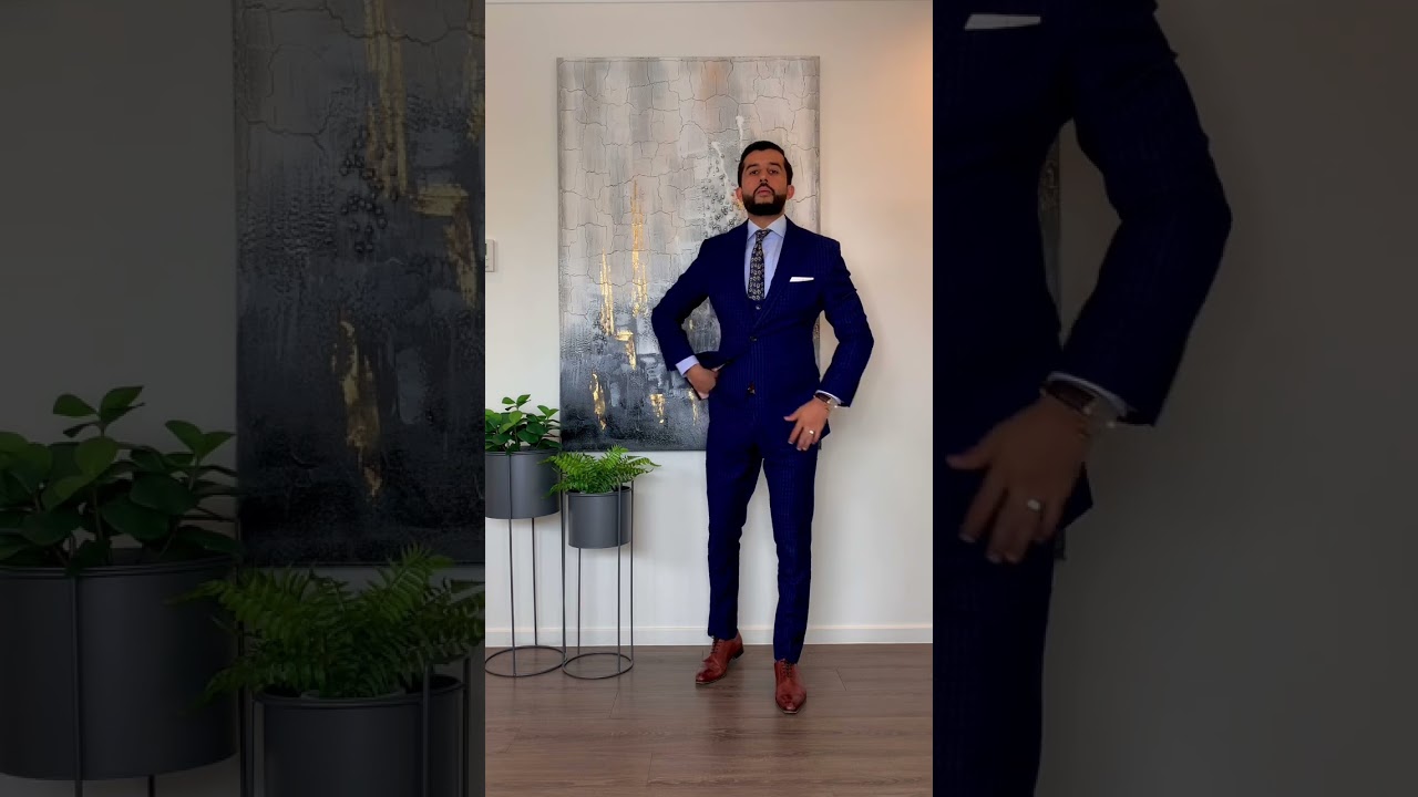 The 3 piece check blue suit..