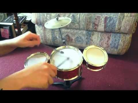 Mini jazz drum set for kids with 3 musical drum, 2 drum stic...