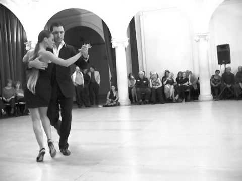  Stella Missé  and  Diego Mohammad  are  dancing  to  the  tango  "  Tres Esquinas  "  by  Ángel D'Agostino  in  2013