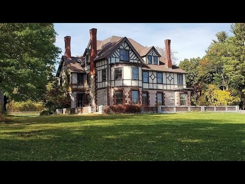 Massachusetts  Tudor Style House For Sale | 6.16 acres | Pastoral pond views | Curved French Doors