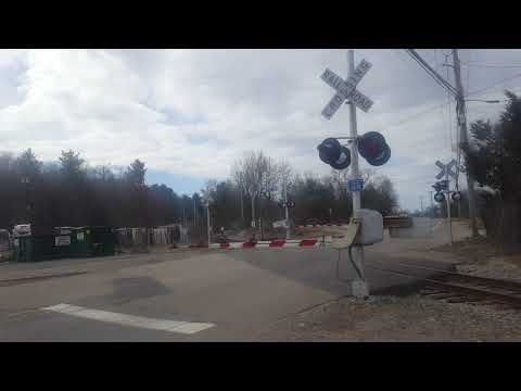 Inbound MBTA crosses Grove Street in Franklin MA