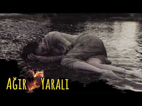 Şehirli Ozan - Ağır Yaralı l Official music audio ® 2025