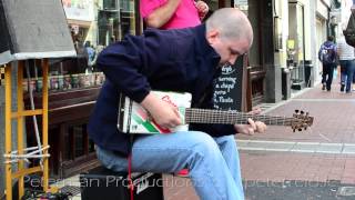 Oil Can Guitar Street Performer Video