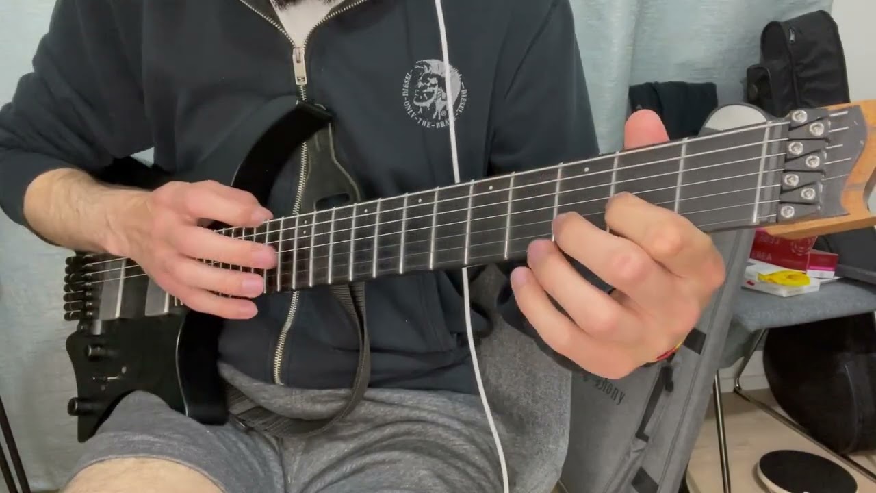 Roberto Barlocci playing an octave displacement tapping lick on electric guitar