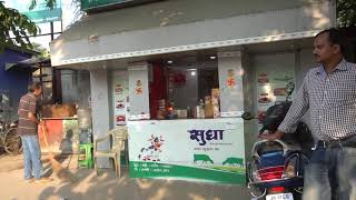 Royalty Free Video Footage | Man cleaning road near his shop