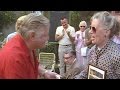 Benny Hill presents money to the Guide Dogs Association at the Kings Head (1991)