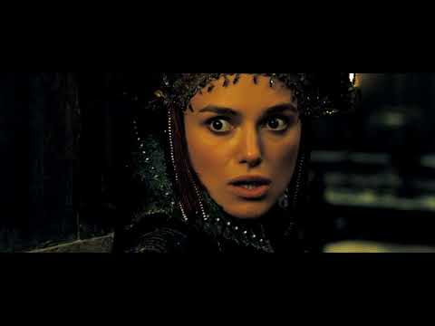 Official trailer frame: the Black Pearl and the Flying Dutchman circling in the maelstrom as drums and choir surge