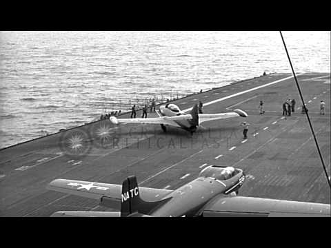 F2H Banshee aircraft catapults from USS Midway. HD Stock Footage