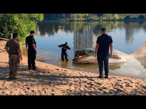 The fishermen nearly fainted when they saw what was inside the giant catfish...