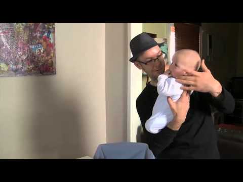 Watch — How to hold a newborn: tips for dads — Raising Children Network