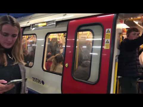 London Underground Distrust line S7 stock depart at South Kensington for Richmond