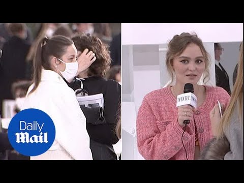 Lily Rose Depp flashes her toned abs at Chanel's Paris Fashion Week show
