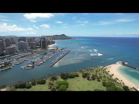 Aerial 4k view of the densest parts of Honolulu, including Kakaako, Ala Moana beach and condominiums, and Waikiki's hotels and beaches