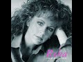 Reba McEntire-  I Wouldn't Go That Far