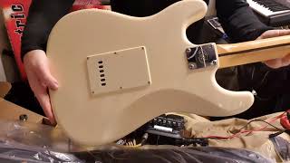 Video thumbnail for Proper unboxing of SX SST57 Stratocasters - lovely colour and great feel by Stephen Hookings