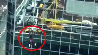 WATCH: Construction worker dangles from crane in Toronto