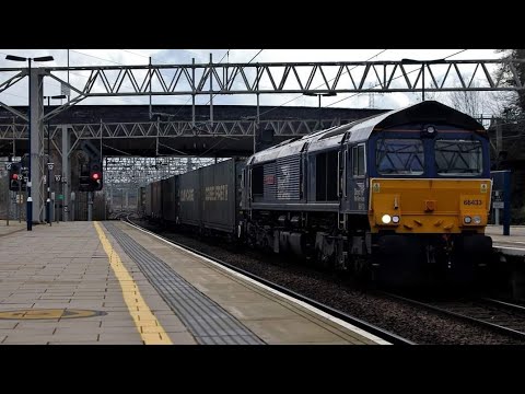 Stafford Railway Station 66433 DRS passes P5 on 4S44 on the 10th February 2024