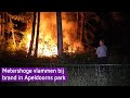Brand in park in Apeldoorn, vlammen slaan metershoog uit