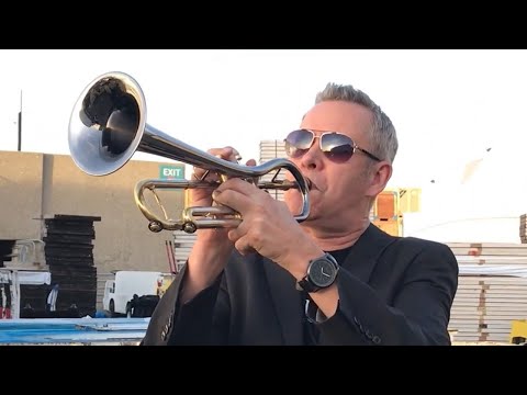 CarolBrass dealer Jim Bohm demos Alexis Baro model in 2019 NAMM SHOW