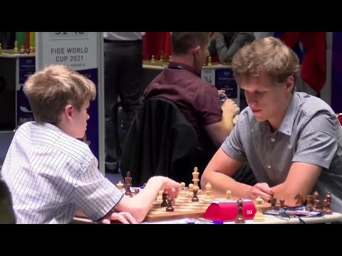 14-year-old Volodar Murzin and Grandmaster Vladislav Artemiev Discuss the Game