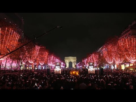 Léa Seydoux switches on Champs-Élysées Christmas lights as Paris launches festive season