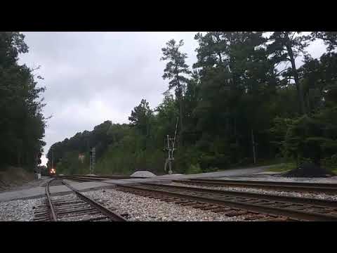 BNSF 9156 leads NS 734 southbound at Long