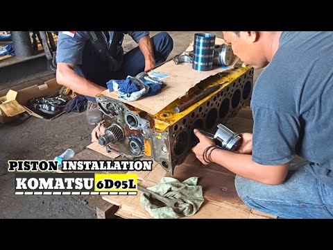 Komatsu 6D95L piston installation process