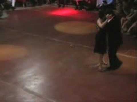  Corina de la Rosa  and  Julio Balmaceda  are  dancing  to  the  tango  "  Caricias  "